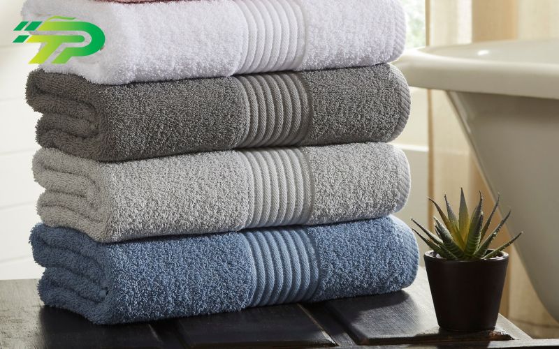 cách làm quần áo khô nhanh trong 5 phút là sử dụng khăn